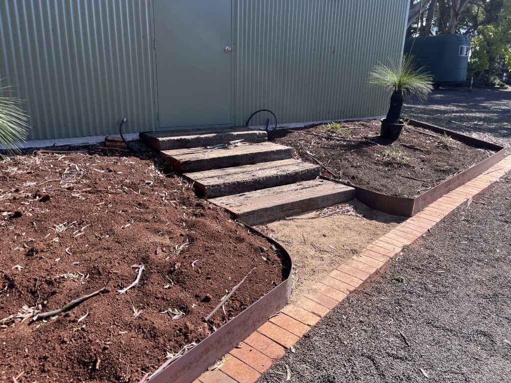 Completed sleeper steps leading to the shed