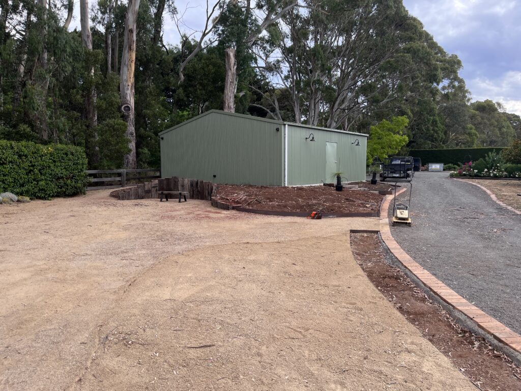 Steel edging and garden shaping in progress