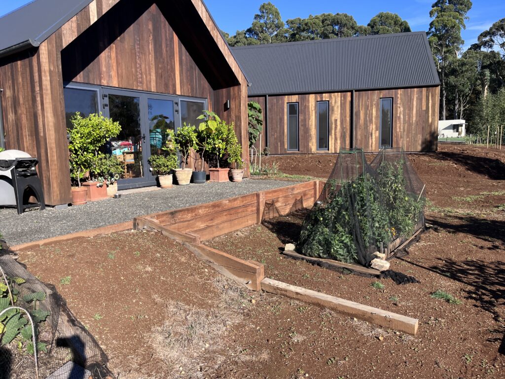 Completed retaining wall and steel edging